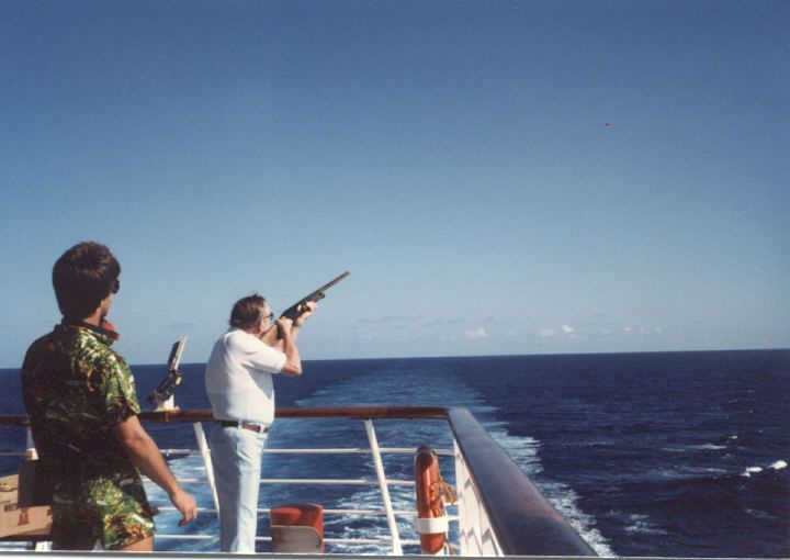 12762-126-1986-02-bill-shooting-on-cruise.jpg